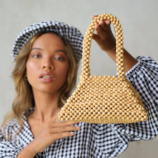 Women’s beige tote bag with pyramid bead embellishments, boho chic handcrafted summer accessory for ethnic and casual outfits